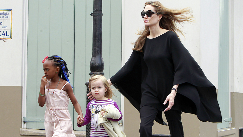 Illustration for article titled Pax Jolie-Pitt Has Attitude; Zahara Jolie-Pitt Has Blue Extensions